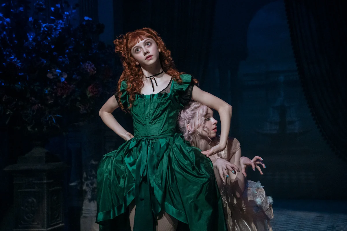 Emma Myers as Enid Sinclair dances with Evie Templeton as Agnes in Wednesday Season 2