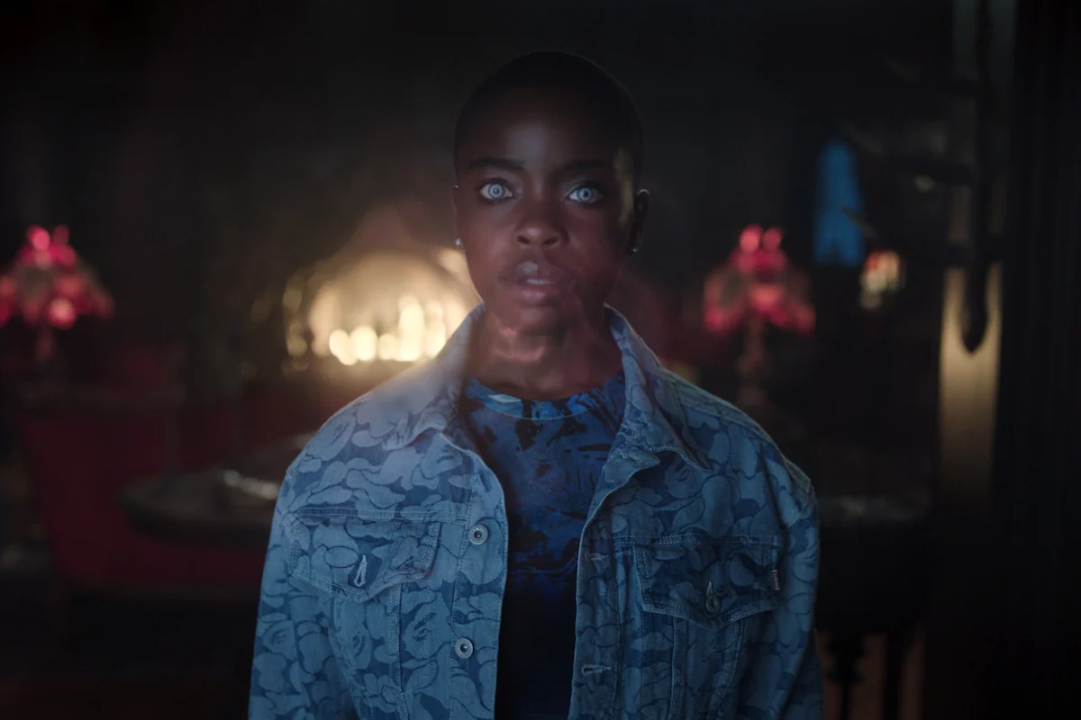 Joy Sunday as Bianca Barclay in a dark room in a Wednesday Season 2 still on Netflix
