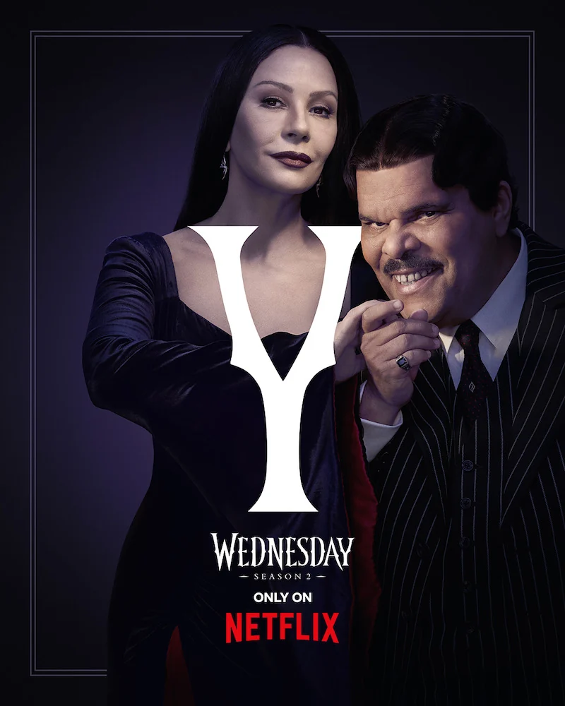 Gomez and Morticia Addams key art from Wednesday Season 2 featuring Luis Guzman and Catherine Zeta-Jones