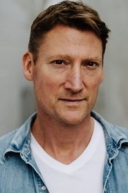 Aaron Pearl as Henry Dobbs in Tracker