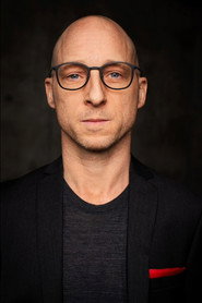 Kyle Mitchell as Chuck Hertzyl in Tracker