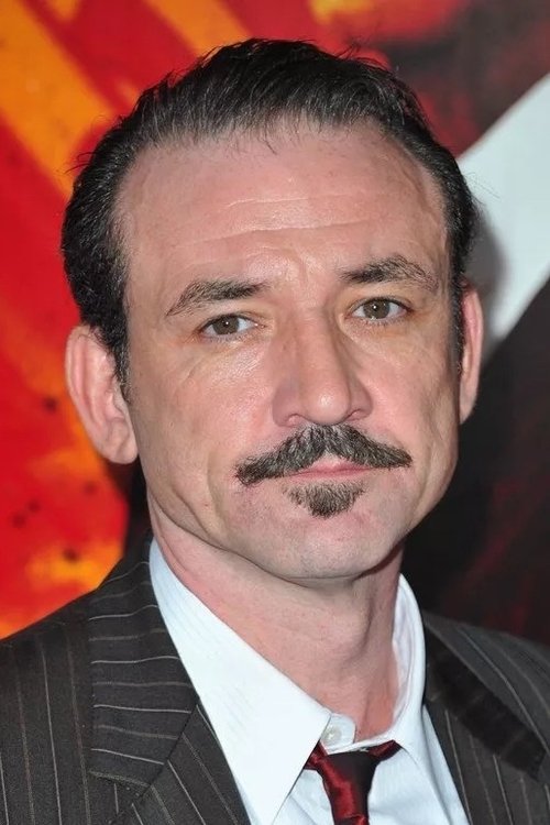 Ritchie Coster as Caolan Waltrip in Tulsa King Ritchie Coster as Caolan Waltrip in Tulsa King